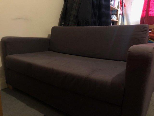 Preview of the first image of BEST OFFER ACCEPTED - Blue two-seater sofa.