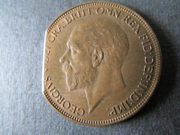 Image 3 of 1927 GEORGE V ONE PENNY WITH PART OF SIDE MISSING.