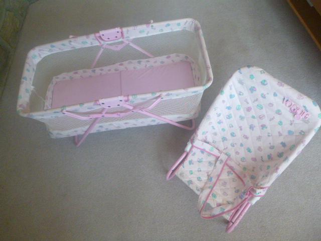 Preview of the first image of Doll's Cot And Bouncing Chair. VGC. BOLTON.