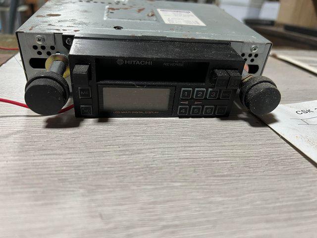 Preview of the first image of Hitachi cassette car stereo with brackets.
