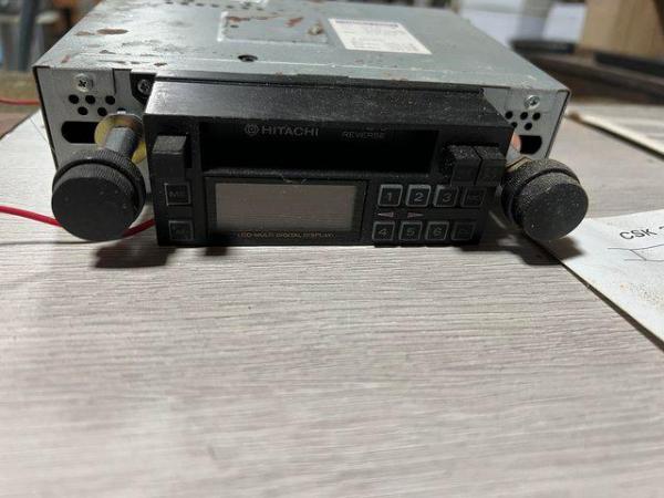 Image 1 of Hitachi cassette car stereo with brackets