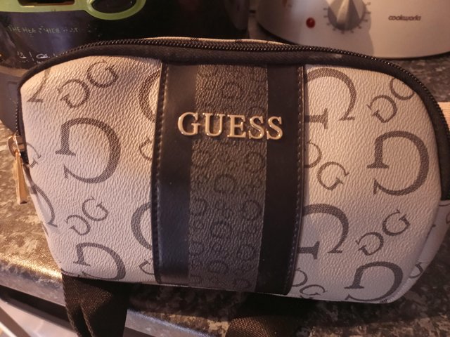 Preview of the first image of Guess bum bag gray & black.