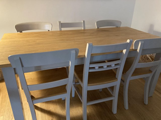 Preview of the first image of Solid Oak dining table and chair set.