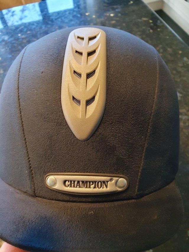 Preview of the first image of Champion riding hat barely used.