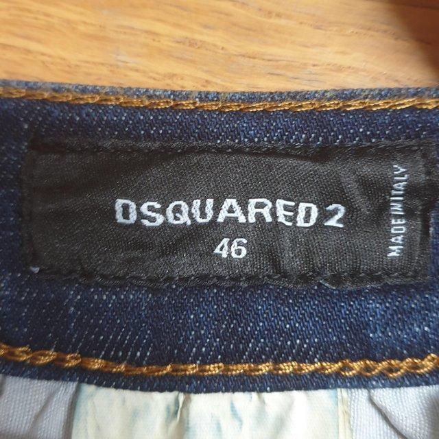 Preview of the first image of dsquared2 paint splatter jeans.