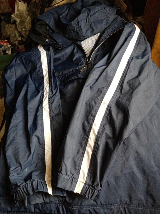 Preview of the first image of Nike Quality Kagool XL. As new good condition.