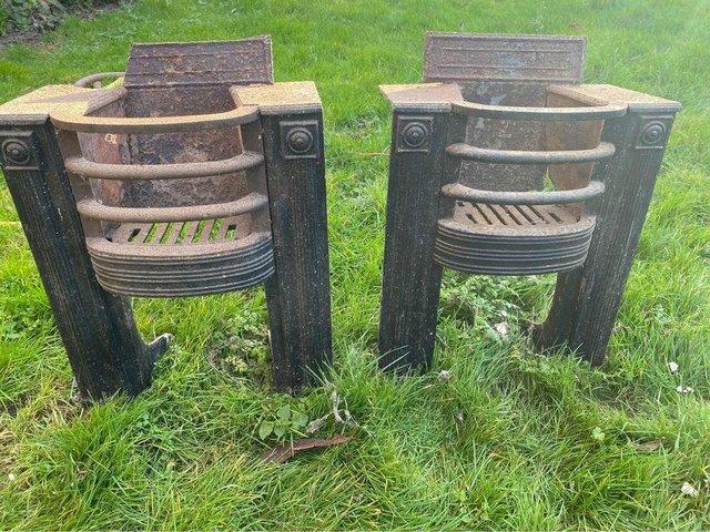 Preview of the first image of 2 METAL ANTIQUE FIRE PLACES GRATES.