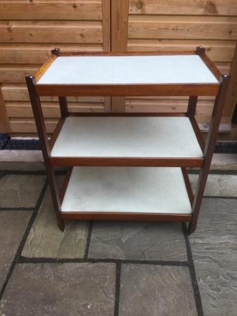 Image 1 of A vintage three tier storage rack with melamine surfaces.