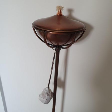 Image 1 of 9 available. Antique Copper effect oil burners on stake