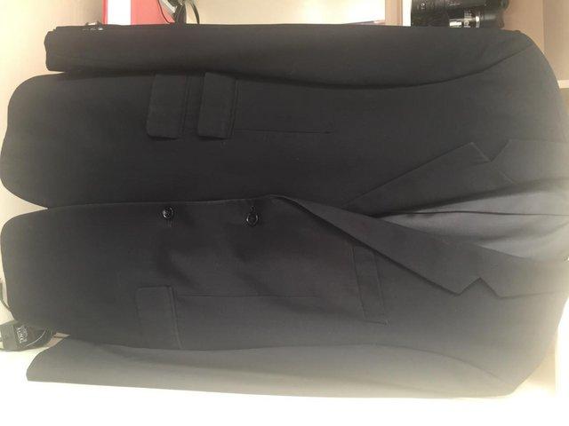 Preview of the first image of Gents formal black jacket from Top Man.