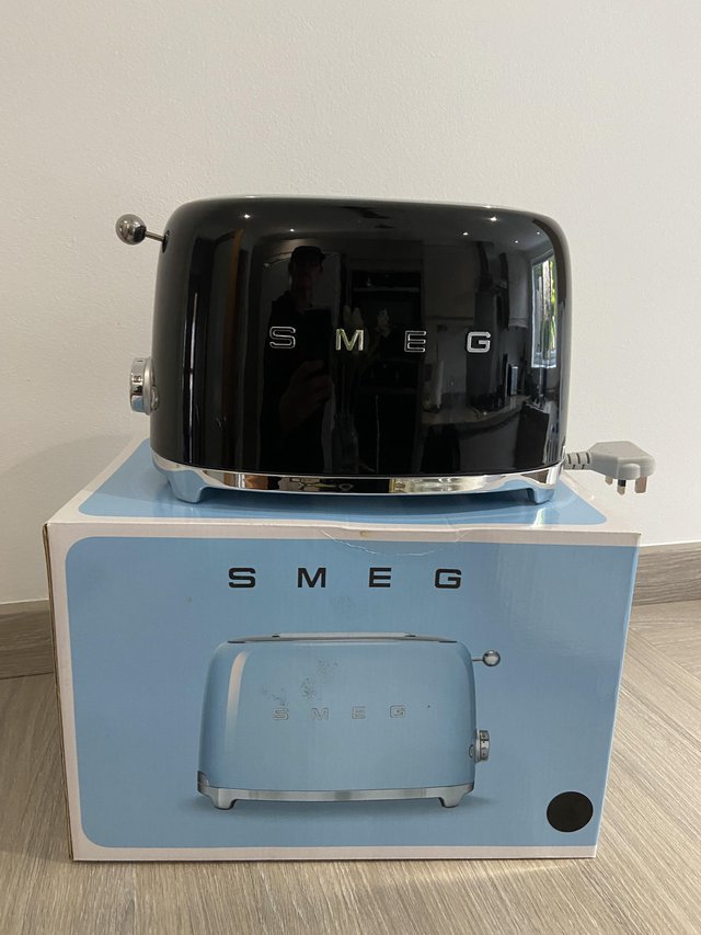 Preview of the first image of Smeg black two slice toaster.