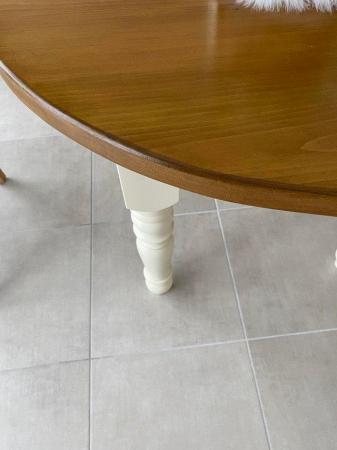 Image 2 of Wood and cream base legged table