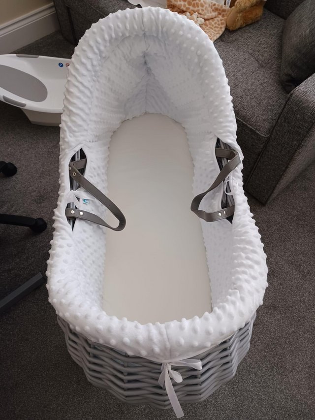 Preview of the first image of Moses basket with rocking stand.