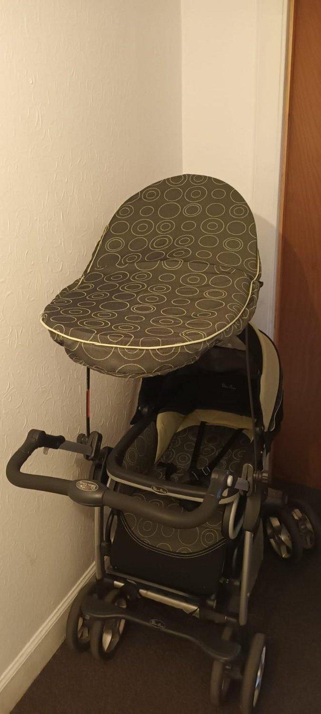 Preview of the first image of Silver Cross pram with accesories.