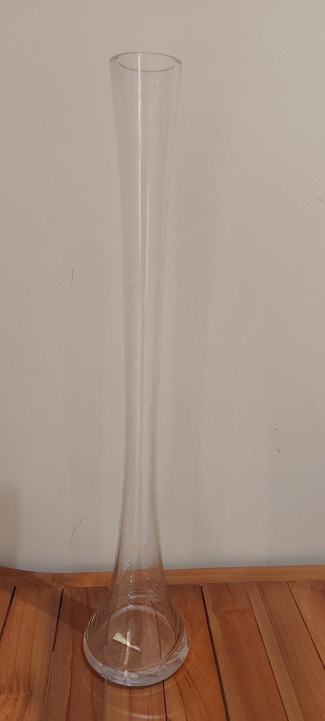 Preview of the first image of Clear glass tall vases, 10no. In good condition.