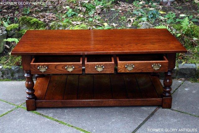 Image 113 of TAYLOR & Co STRESSED OAK THREE DRAWER POTBOARD COFFEE TABLE