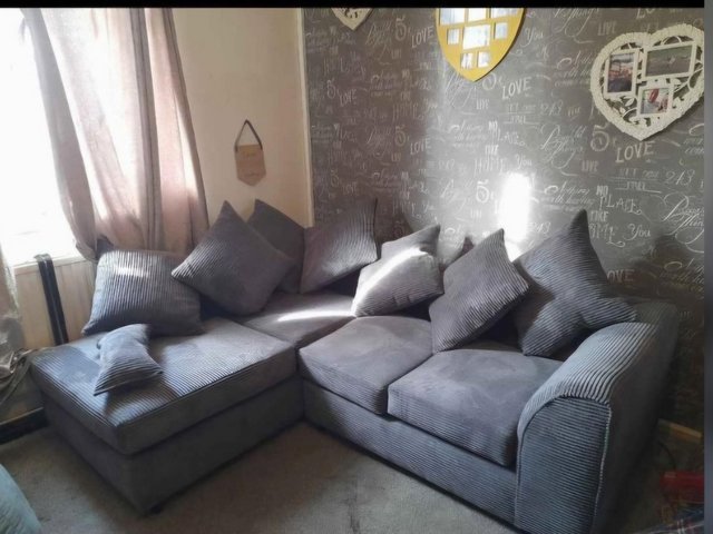 Preview of the first image of Grey cord corner sofa lefthand.