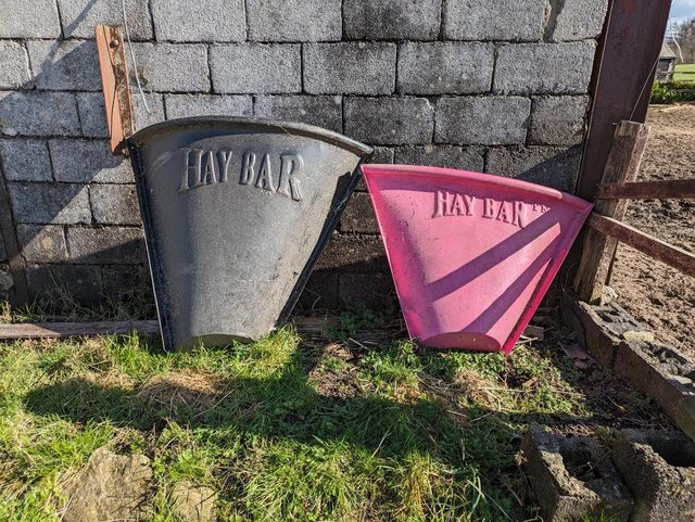 Preview of the first image of Two used plastic hay bars for sale.