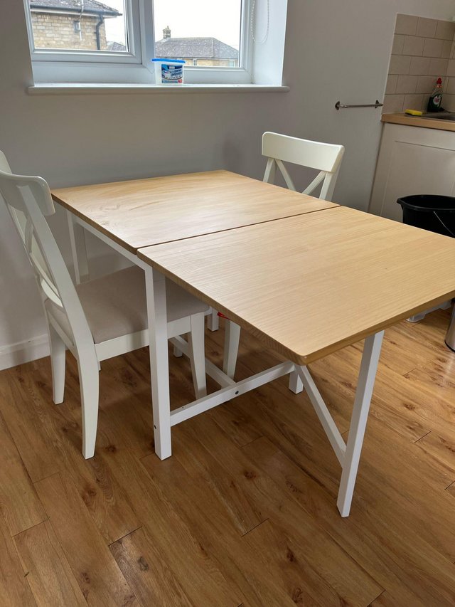 Preview of the first image of IKEA pinntorp table and 2 ikea ingolf chairs.