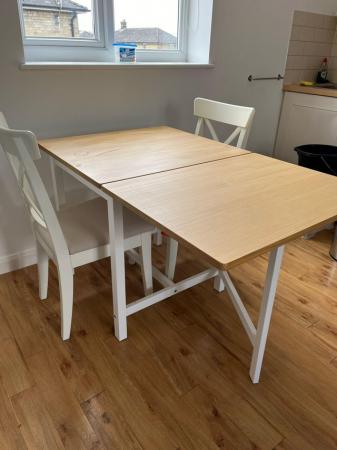 Image 1 of IKEA pinntorp table and 2 ikea ingolf chairs