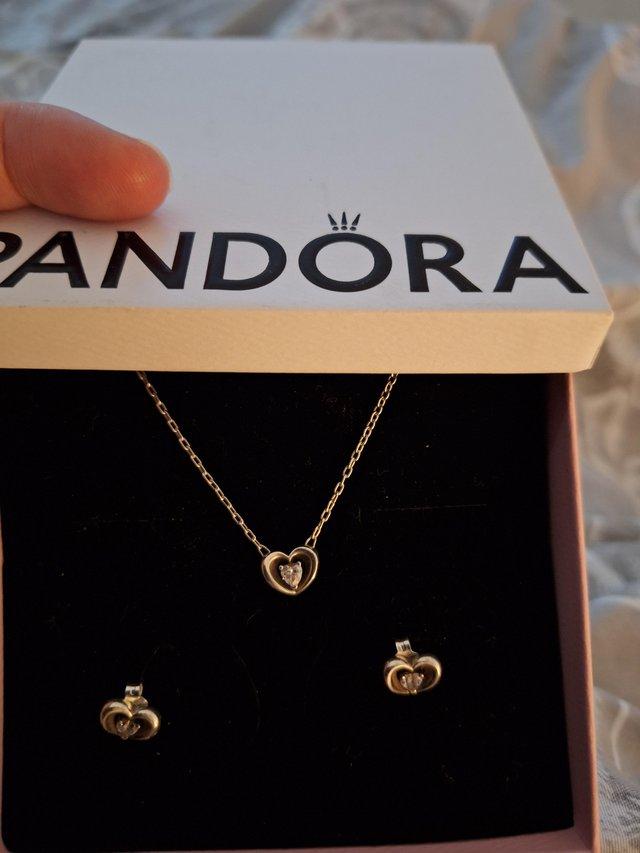 Preview of the first image of Genuine Pandora necklace and earings set.