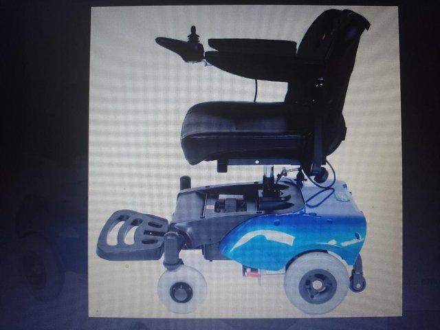 Preview of the first image of ex demo power wheelchair with warranty.