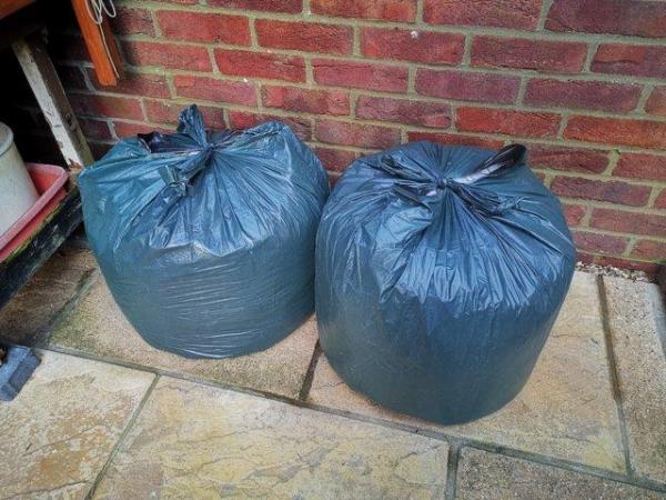 Image 2 of Guinea pig hutch waste in black bags - FREE