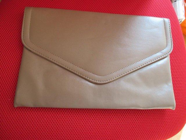 Preview of the first image of LADIES  FAUX  LEATHER COFFEE CLUTCH BAG.