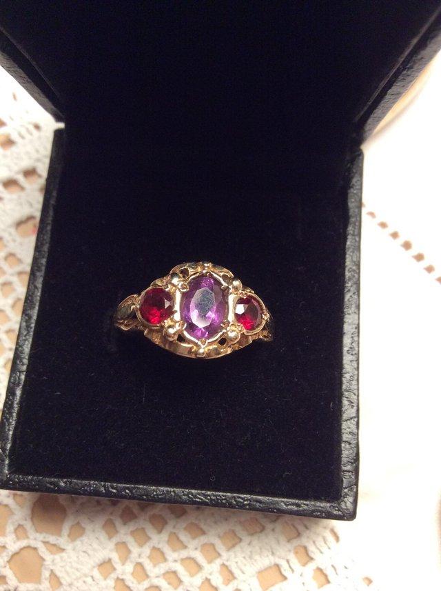 Preview of the first image of Vintage Amethyst and Garnet 9c gold ring.