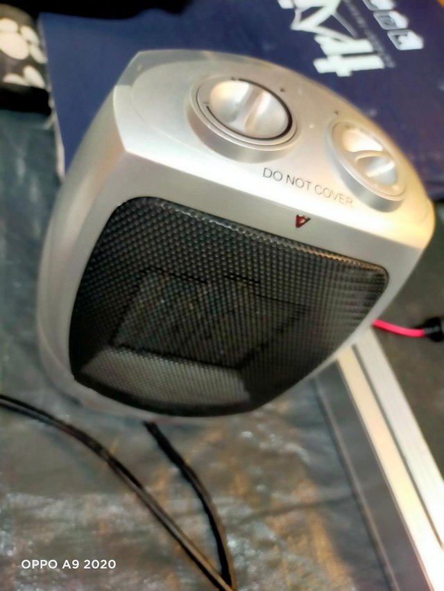 Preview of the first image of small 2 speed fan heater.