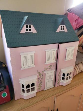 Image 1 of Wooden Dolls House complete with figures and furniture