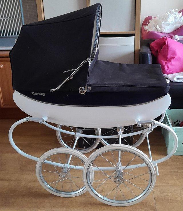 Preview of the first image of Vintage triang dolls pram needs some tlc.