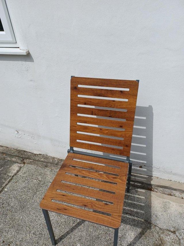 Preview of the first image of No Maintenance Wood Effect Outdoor Chairs.