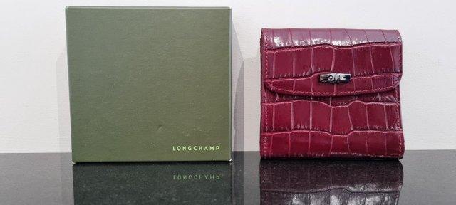 Preview of the first image of Longchamp compact wallet – bordeaux crocodile calfskin.