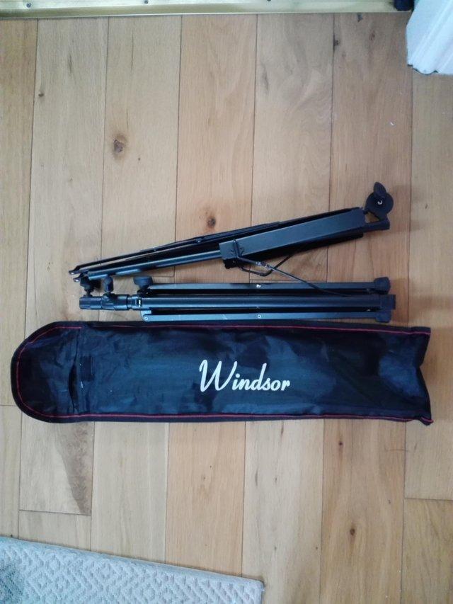 Preview of the first image of Windsor folding music stand in carrying pouch.