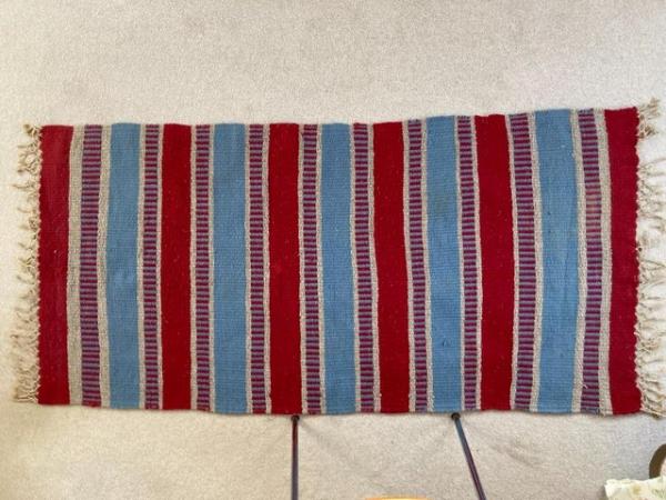 Image 2 of Hand woven wool rug in red, blue & grey 150 x 75cm + tassels
