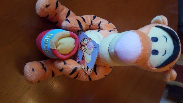 Preview of the first image of Disney Fisher Price Tigger With Hunny Pot 2004.
