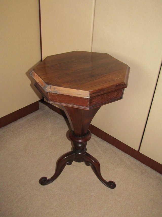 Preview of the first image of Antique trumpet sewing/knitting table.