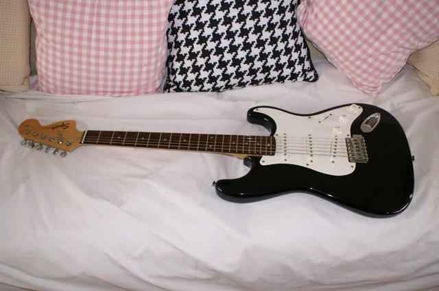 Preview of the first image of Squire Stratocaster Black 2002.