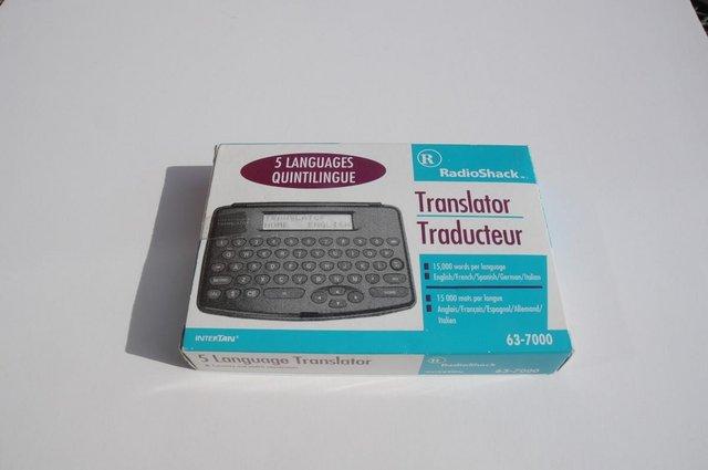 Preview of the first image of Translator Currency Converter And Calculator By RadioShack.