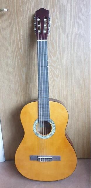 Preview of the first image of Strong Wind Classical Acoustic Guitar In Good Condition.