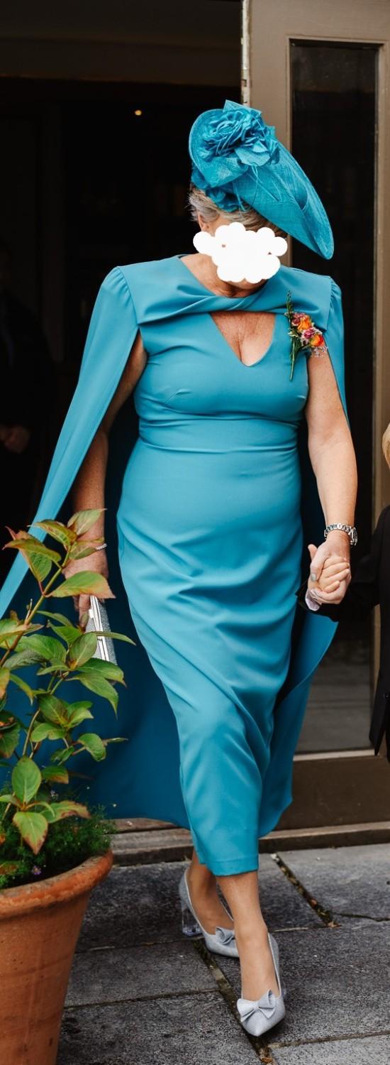 Preview of the first image of Stunning Teal Cape Dress.