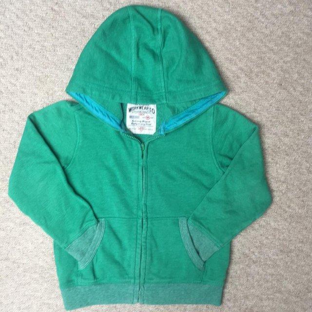 Preview of the first image of M&S green zipped sweatshirt/hoodie. Age 4-5 yrs. Can post..