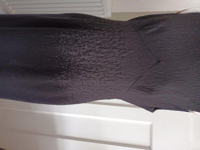 Preview of the first image of Ladies Black Dress with a textured weave Size EU/42 Medium U.
