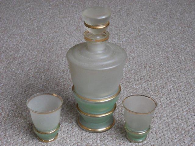 Preview of the first image of 1950s/1960s frosted glass decanter & 2 glasses. Gilt banded.