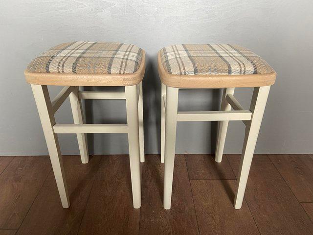 Preview of the first image of Solid wood pair stools tartan.