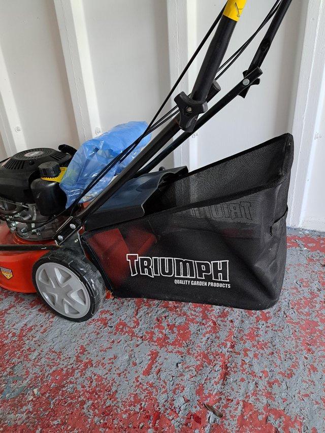 Preview of the first image of Trumpth mower never used good quality.