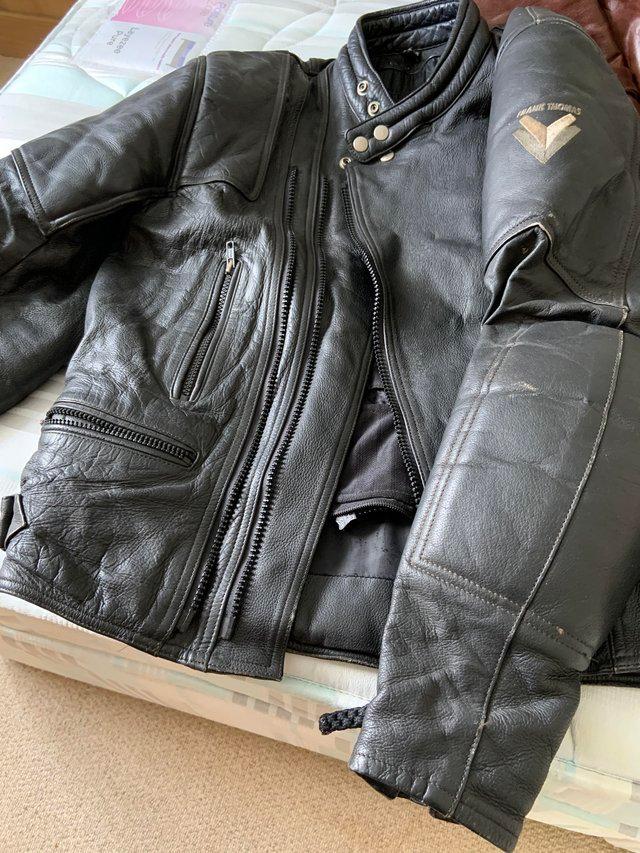Preview of the first image of Black Leather Bike Jacket may have the armour.