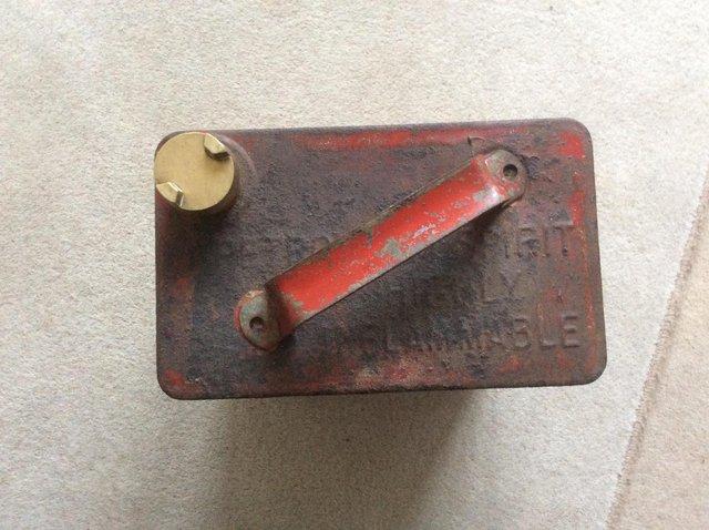 Preview of the first image of Vintage Red Petrol Can Complete with Brass Cap.