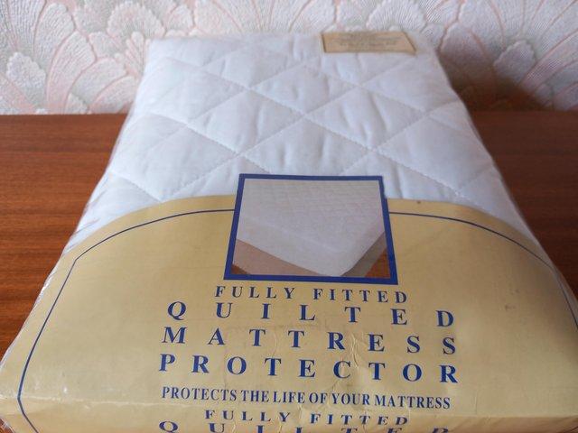Preview of the first image of Mattress Protector, unused and in sealed packaging.